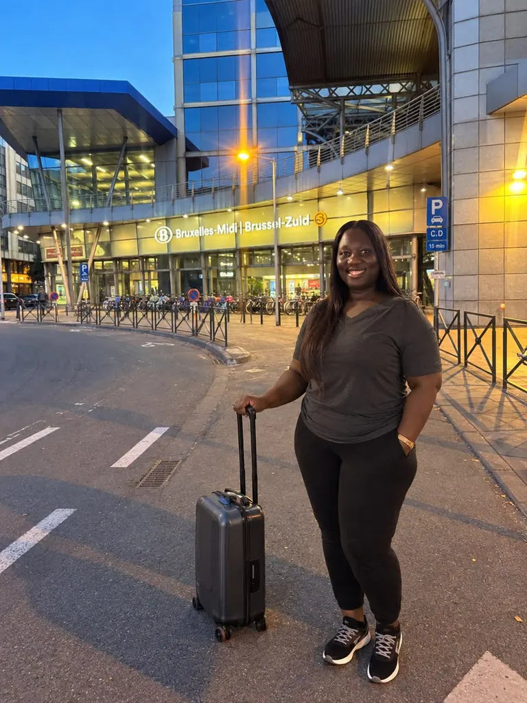 Irene with her suitcase outside Bruxelles-Midi / Brussel-Zuid railway station