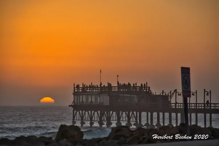 The sun setting over the Atlantic beside Swakopmund’s jetty